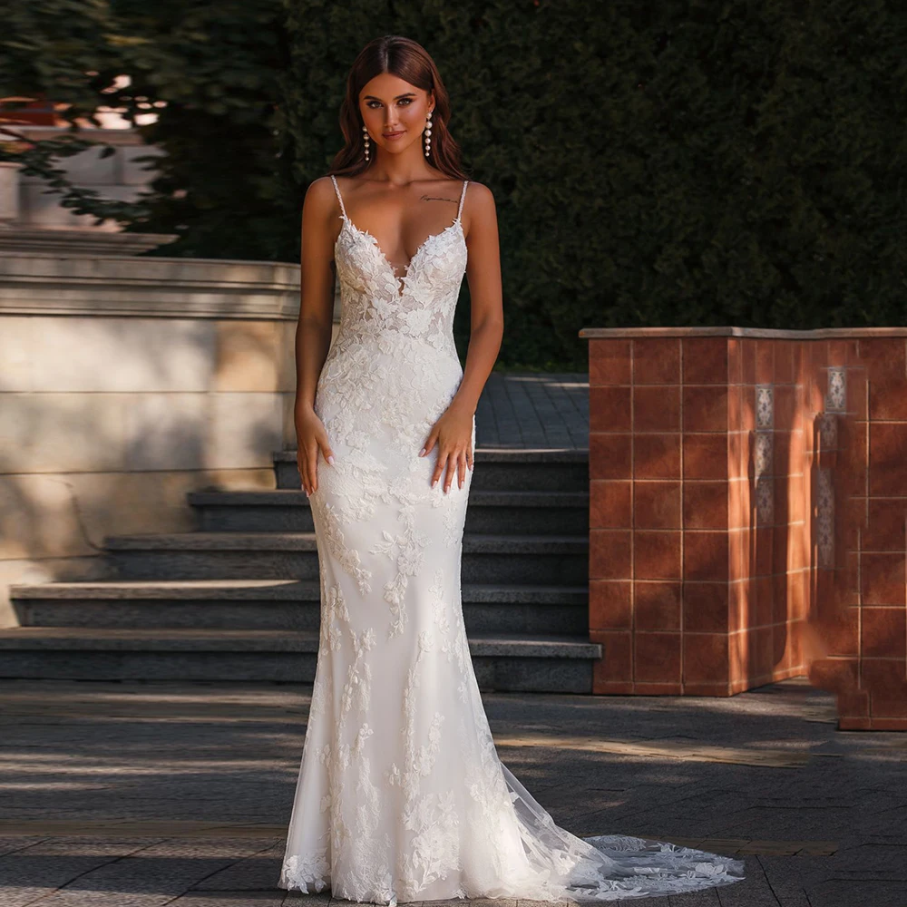 Dostosowane pasek Spaghetti suknie ślubne syrenka V Neck bez rękawów afrykańskie suknie ślubne koronkowe aplikacje Vestidos De Novia 2025