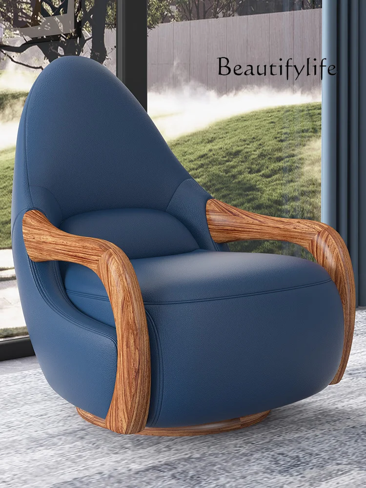 

Ugyen Wood New Chinese Style Casual Swivel Chair Solid Wood Leather Armchair Designer Wingback Chair