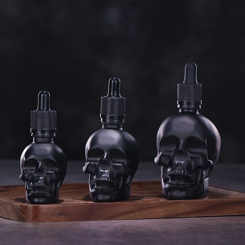 30ml 60ml 120ml Skull Bottle Bitter Bottle E Liquid Frosted Black Skull Shape Glass Dropper Bottle With Child Proof