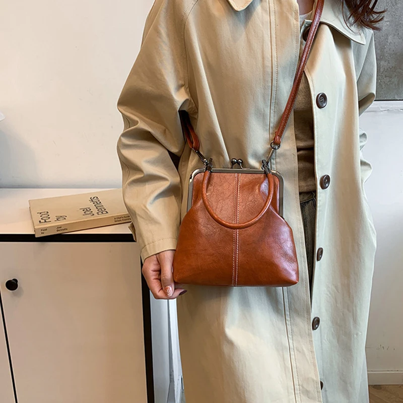 Elegante Clip Lock Umhängetasche Große Kapazität PU Leder Umhängetasche Einfarbig Retro frauen Kleine Handtasche – Detail 10