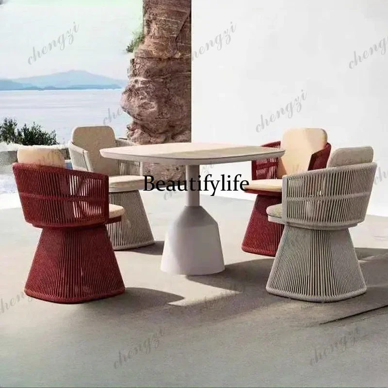 X173 Nordic rattan outdoor table and chair villa courtyard garden rotating rattan chair creative rope table and chair combinatio