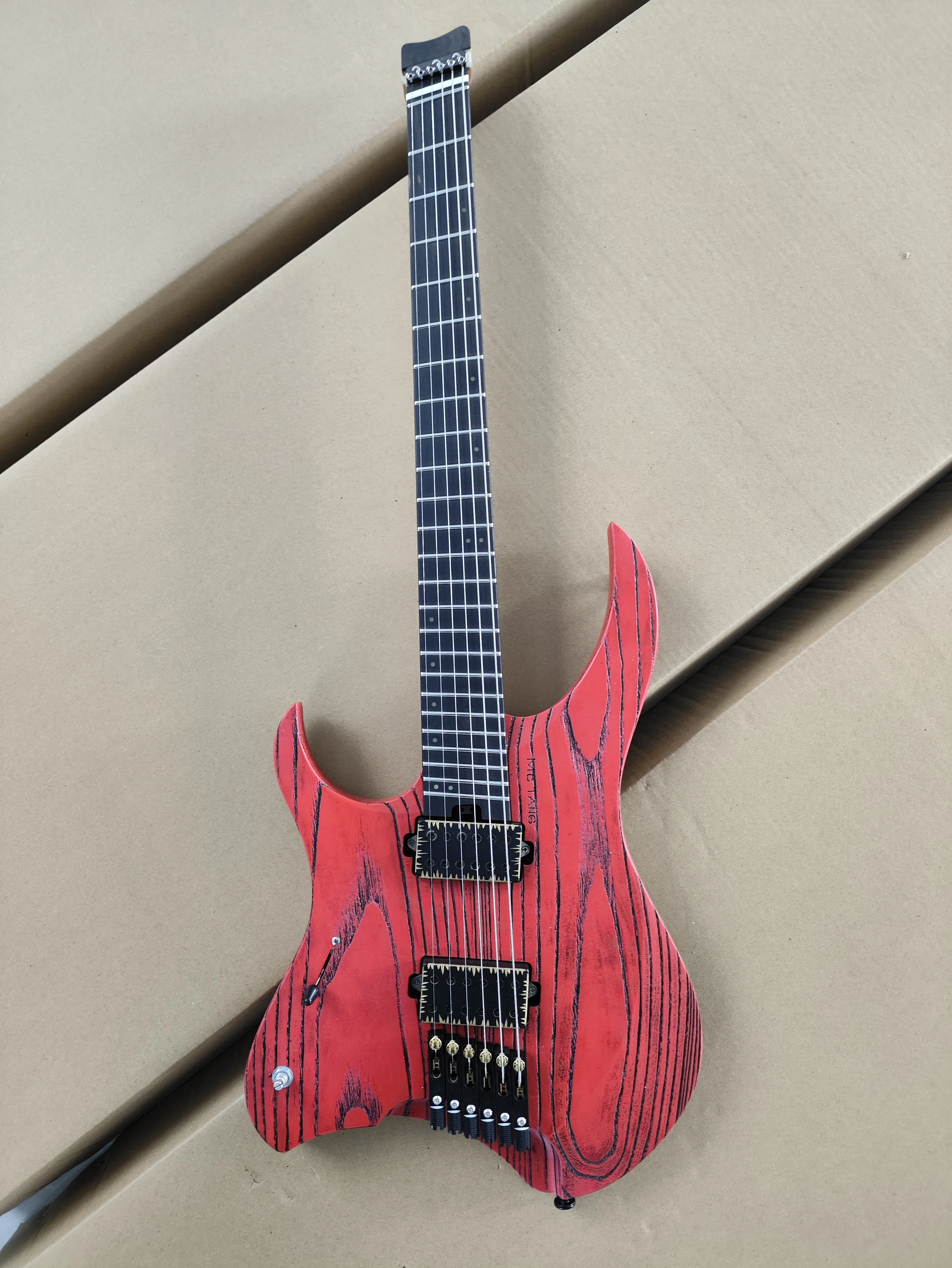 

Lefthands McTang Headless Electric Guitar, Fan shaped Frets,Handmade ， sandblasted