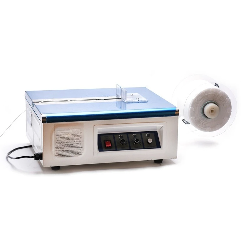 

Small plastic belt baler Desktop hot melt baler Carton strapping automatic