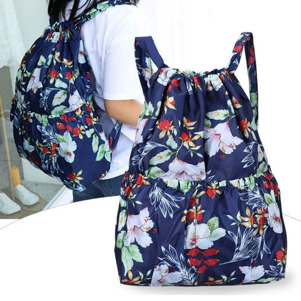 กระเป๋าหูรูดพิมพ์ลายดอกไม้กันน้ำความจุขนาดใหญ่กระเป๋าช้อปปิ้งแบบพกพาโพลีเอสเตอร์น้ำหนักเบากระเป๋าเป้สะพายหลังวัยรุ่นหญิง