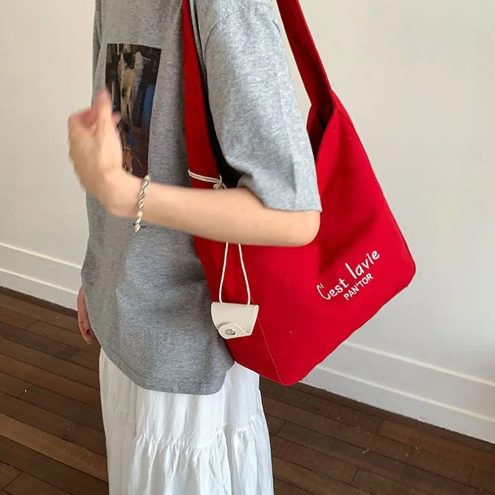 

Simple Korean Letter Shoulder Bag Canvas Large Capacity Student Tote Bag Versatile Casual Women's Armpit Bag Girls