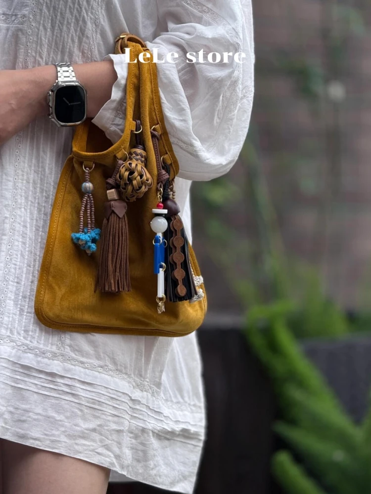 

Miu Suede Tassel Handbag Frosted Cowhide New 2025 Doll Pendant Handbag Retro Fringe Handbag Soft Vertical Square ape