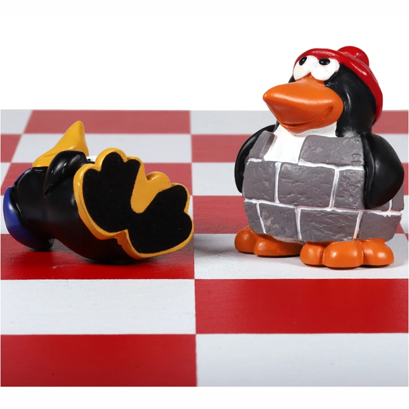 Cartoon penguin shape chess set hand-painted resin chess piece king height 7cm built-in wood PU surface chessboard 40cm I188