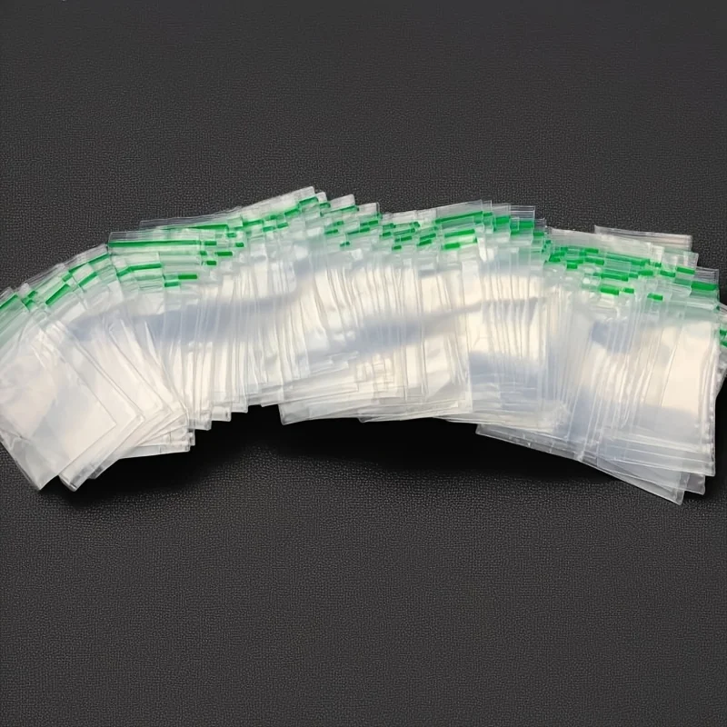 100Pcs Thick Reusable Mini Zip Lock Bags 4x6cm Transparent Elastic Green Buckle Seal Storage Pouches Durable Self Sealing Plasti
