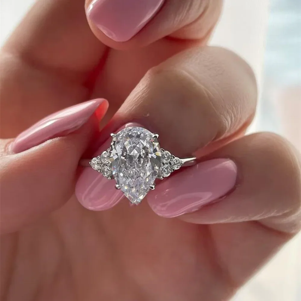 

Ювелирные изделия из стерлингового серебра 925 пробы, оптовая продажа, позолоченное кольцо с цирконом в форме капли для женщин, обручальное кольцо высокого качества