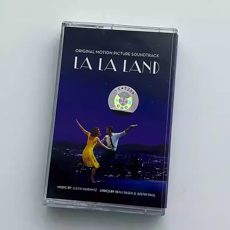 

Музыкальный саундтрек к фильму «Ла-Ла Ленд» Джастина Хёрвитза, аудиокассета, оригинальный саундтрек к фильму, аудиокассета.