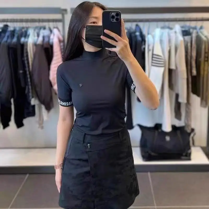 

Minimalist Golf Tee for Women, Stand Collar Short Sleeve Top, Sleek & Stretchable for All-Day Wear