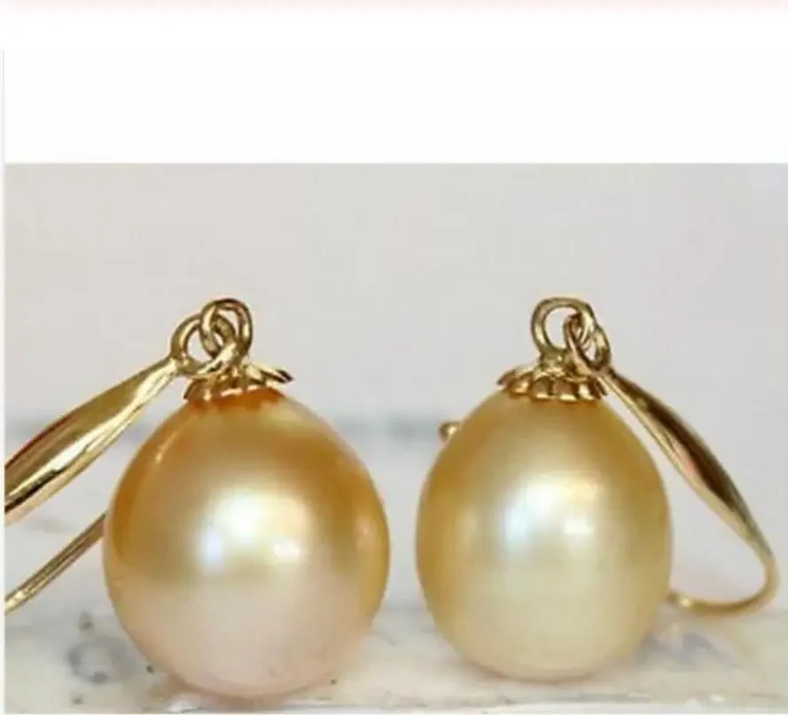 

Пара висячих серег с золотым жемчугом Южного моря диаметром 9–11 мм, 14 карат