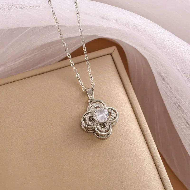 

Новое вращающееся четырехлистное цветочное ожерелье с подвеской из камня подсолнечника для женщин в уникальном и элитном стиле.