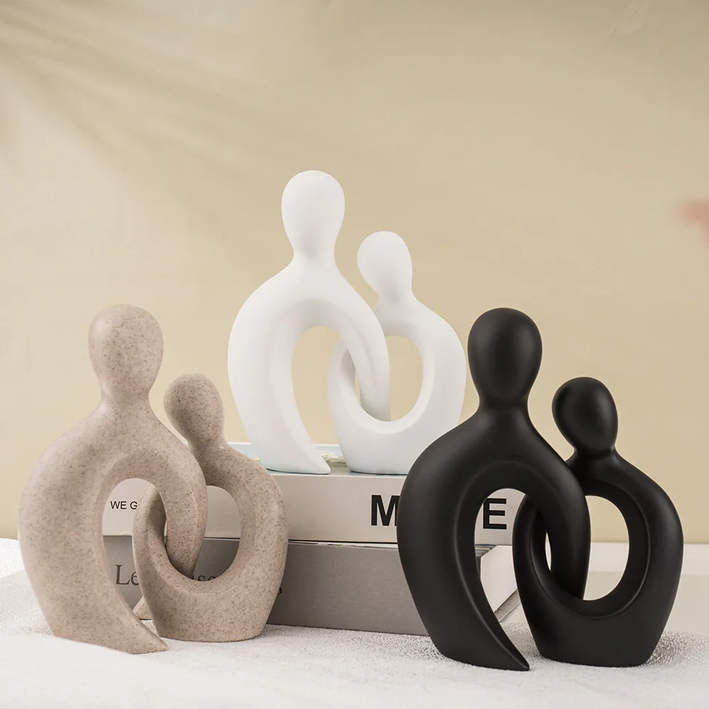 

New abstract character ornament living room TV cabinet couple cross home decoration resin crafts