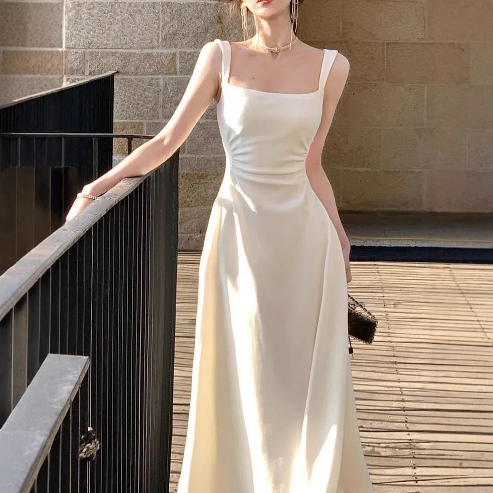 French high-end first love white suspender dress women's summer wear 2026 new summer long skirt temperament slim