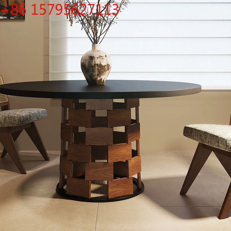 

Medieval wabi sandy wind black rock version dining table household high-end small apartment round table French retro solid wood