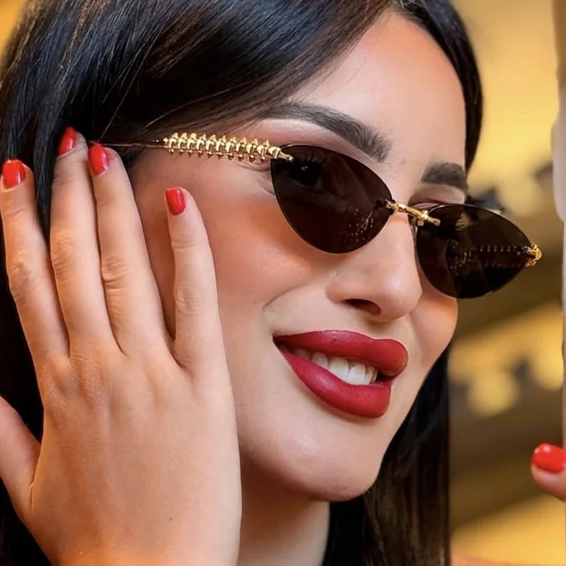 

New Retro Cat Eye Rimless Sunglasses Women Luxury Fashion Brand Oval Narrow Sun Glasses Shades Trendy Elegant Unique Eyewear