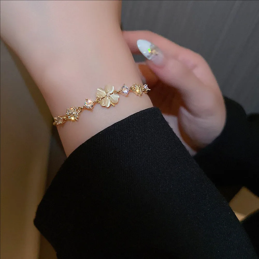 

New Bracelets Genuine Golden Plating Exuding Ethereal Charm Featuring Crystal-encrusted Cat's Eye Stone Petal Flowers Jewelry