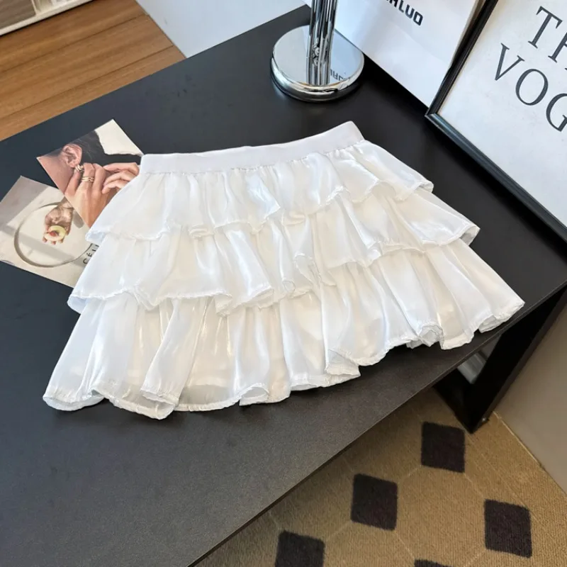 เค้กสีชมพูหวานกระโปรงผู้หญิง 2025 ฤดูร้อนเอวสูง A-Line กระโปรงมินิ Kawaii Layered Ruffles Elastic เอว Lolita Y2K กางเกง