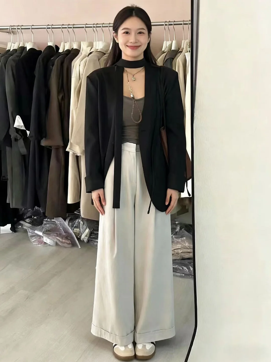 

Элегантный черный женский пиджак с поясом в корейском стиле, модный тренд Весна 2026, для офиса, свободный крой, длинный рукав