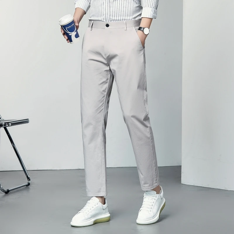Pantaloni comodi da uomo in cotone dritto estivo 2025 Pantaloni corti da uomo Pantaloni da abito casual slim fit testurizzati stile coreano