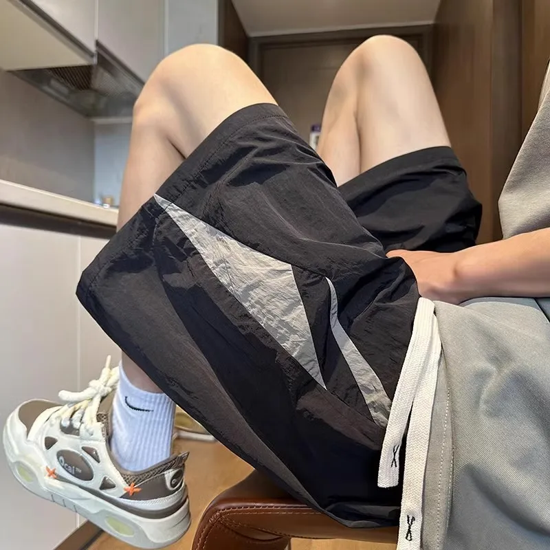 Pantaloni sportivi a cinque punte Baskeall sottili casuali allentati estivi da uomo con colori impiombati retrò che allenano quattro quarti