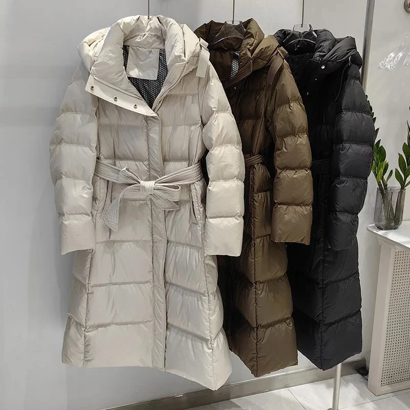

2026 New Women White Duck Down Long Jacket Autumn Winter Warm Office Lady Slim Outwear With Hood Belt Simple Style