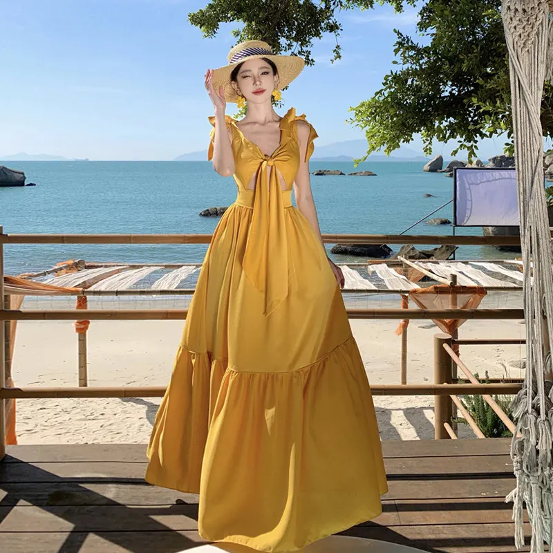 Damen Gelbes Maxikleid mit Bindeband, Schleife vorne, Cut-Out, V-Ausschnitt, Rüschensaum, fließendes A-Linien-Strandkleid, Sommer 2026, Urlaub, Party, Y2K