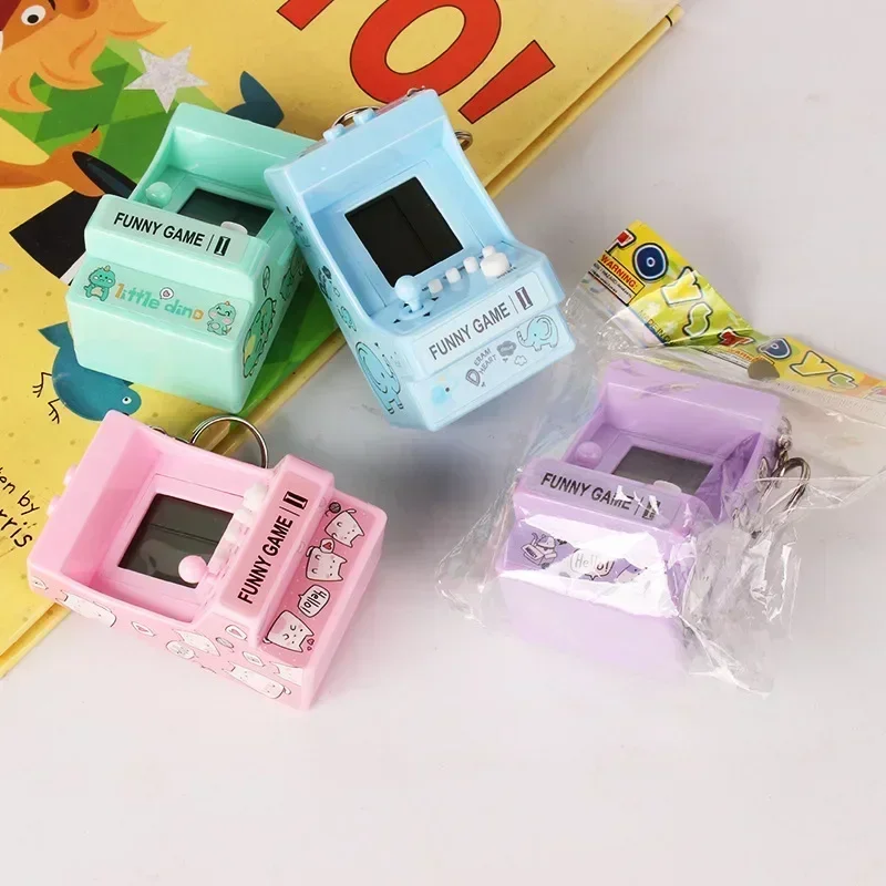 Mini llavero de bolsillo portátil con anillo integrado, consola de juegos electrónica de mano para máquina de juegos de juguete para niños, 26