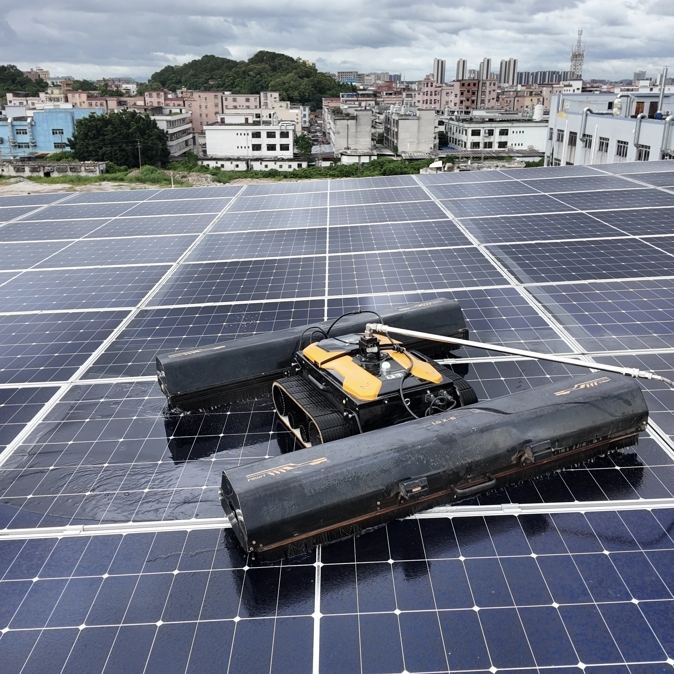Remote Control Track Type PV Cleaning Robot Solar Panel Washing Equipment For Distributed Rooftop Solar Projects