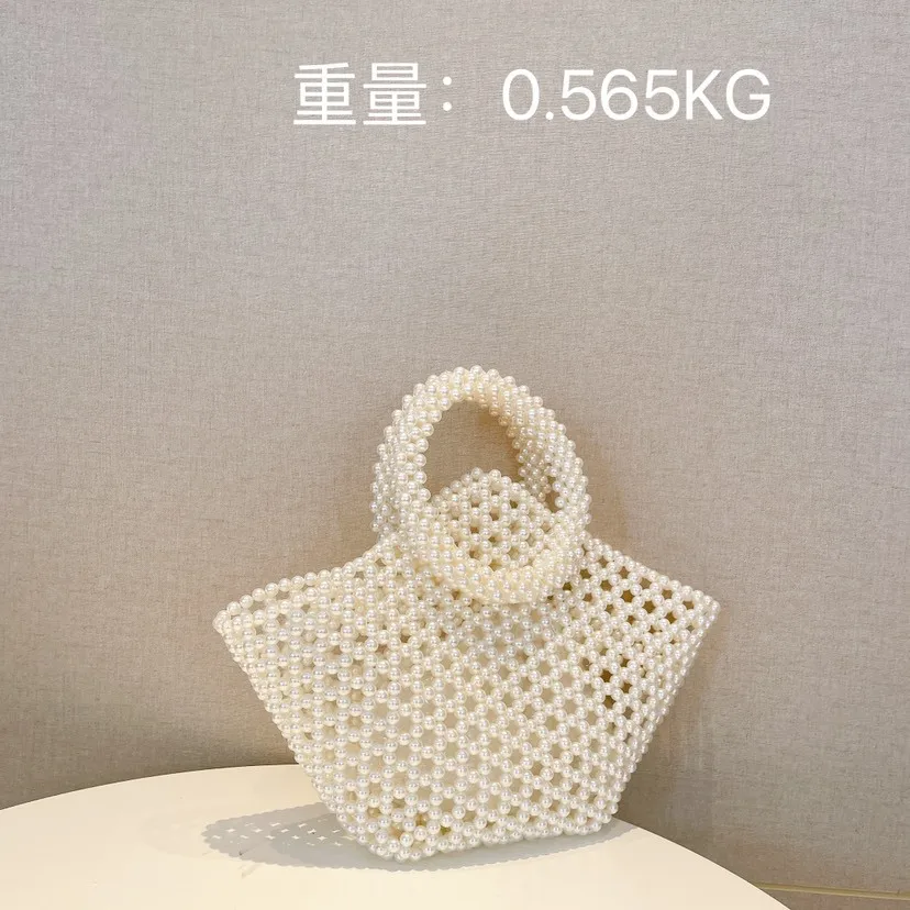 Bag female new small fresh pearl hollowed out handmade beaded large basket bag carrying hand