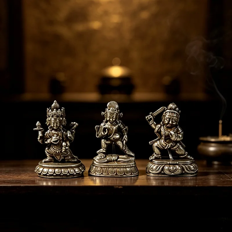 Tibetan-style black statue ornament, white copper three-headed six-armed wealth god, mini Aksarambha Buddha