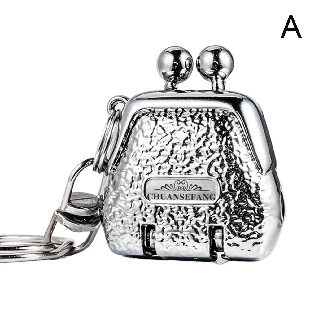 Neue Edelstahl Fingernagel Metall faltbare Mini Nagel Trim Nägel kreative Gepäckfach Schlüsselanhänger