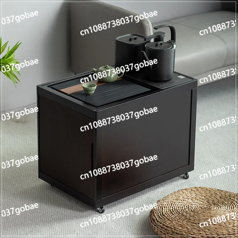 

A Few Small Tea Tables in The Corner of The Wooden Sofa, Side Cabinets for Boiling Water, and A Few Tea Bars in The Living Room.