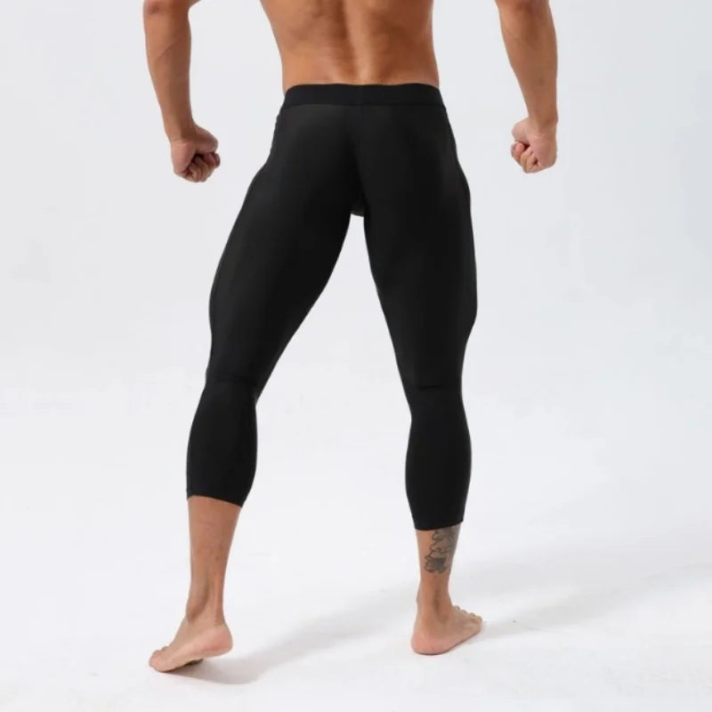 مثير رجل اللياقة البدنية زائد حجم Sweatpants 3/4 السراويل مرونة عالية النمط الأمريكي السراويل سكيت السراويل الرياضية الطويلة