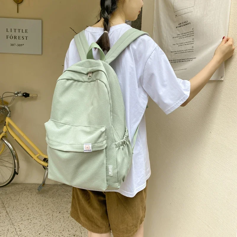 Mochila de nylon impermeável para mulheres, mochila de viagem estilo universitário, mochilas escolares para meninos e meninas adolescentes, monocromática, alta qualidade, nova