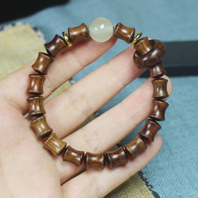 

Black rosewood bamboo knot small bracelet with running ring, wooden craft jewelry for men and women, sandalwood Buddhist beads