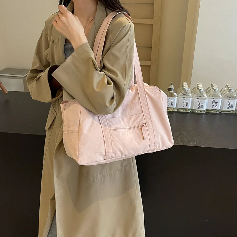 

Lightweight nylon fabric women's bag, large-capacity waterproof hand-held tote bag, commuter single-shoulder bag