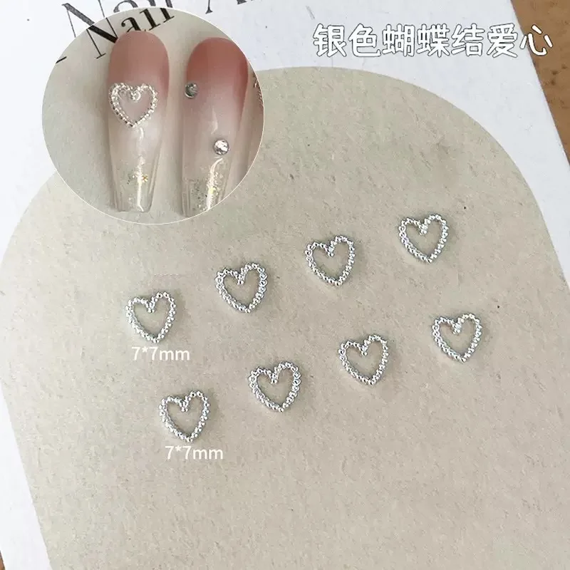 50 pz Lega Arco Cuore Pendenti E Ciondoli Per Unghie Accessori 3D Argento Piccolo Bowkont Ornamenti a forma di Cuore Unghie artistiche Decorazioni Forniture FAI DA TE