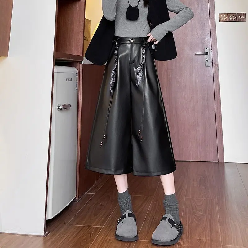 Coffee PU leather eight-point pants women's autumn 2025 new Maillard loose high-waisted and thin versatile straight casual pants