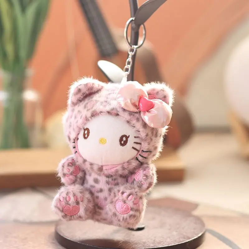 LLavero de peluche Kawaii de Hello Kitty, bonito bolso de muñeca, dije con lazo, estampado de leopardo, tirador de cremallera, regalo, juguetes de peluche para niñas, 1 Uds.