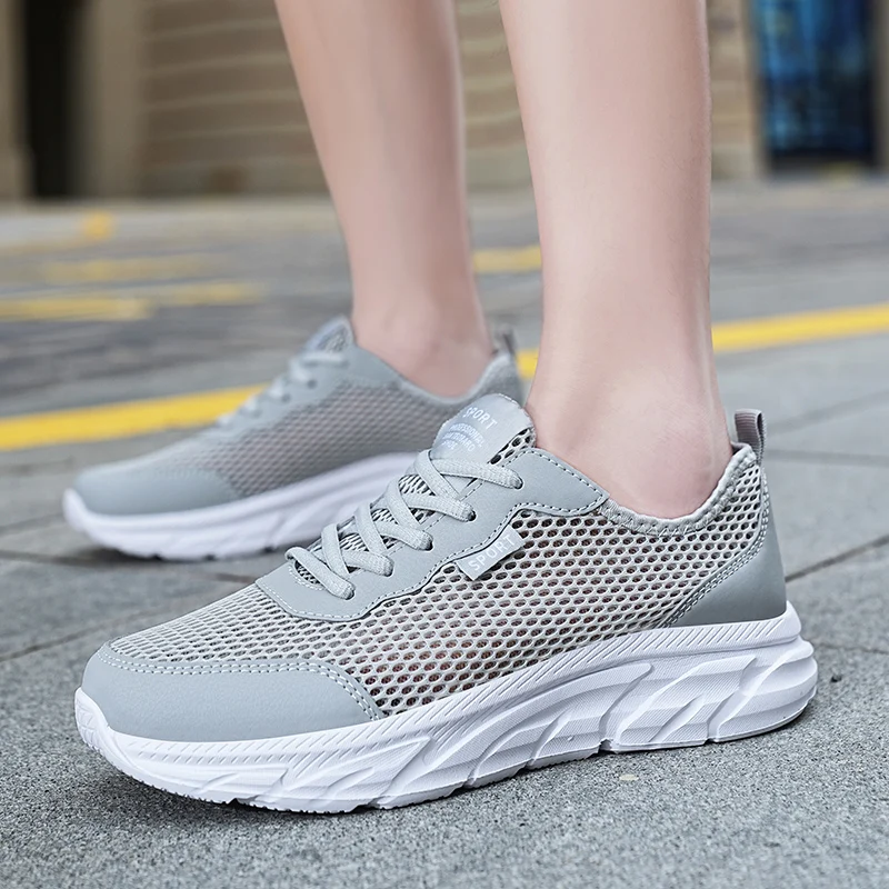 

2026 Men'S Summer Lightweight Breathable Mesh Running Shoes Hollow Soft Soled Casual Shoes Outdoor Wear Resistant Sports Shoes