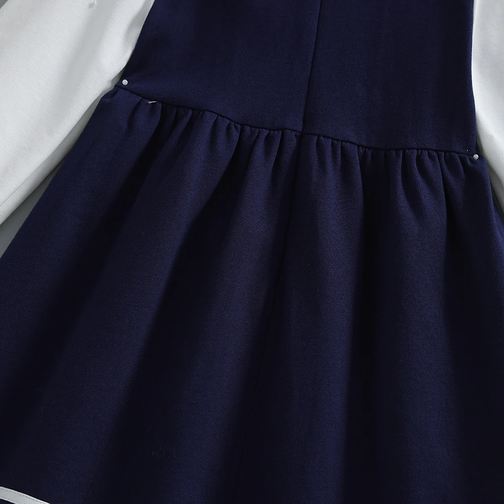 فستان للفتيات الصغيرات على طراز المدرسة باللون الأزرق الداكن والأبيض وياقة مكشكشة وأكمام طويلة للأطفال من عمر 2 إلى 6 سنوات