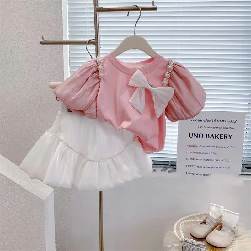 Conjunto de 2 piezas para niña, camiseta de manga corta con perlas que fluyen, falda de hilo y pantalones, ropa para verano, 2024