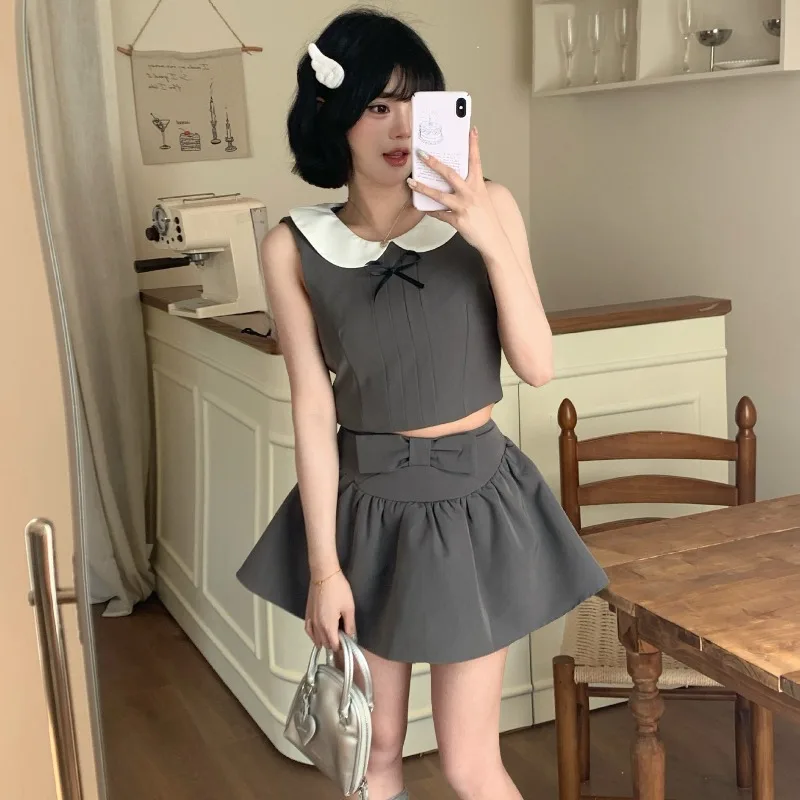Korean Vintage Harajuku Gold Feeling Sweet Doll Collar Vest Top Temperament Bow Half Skirt Street Shot Ins Two-piece Set 니트 스커트