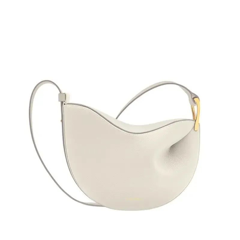 Nouveau sac fourre-tout en forme de pois de haute qualité adapté aux femmes. Conception innovante sous les bras avec des bretelles simples en cuir pour femme