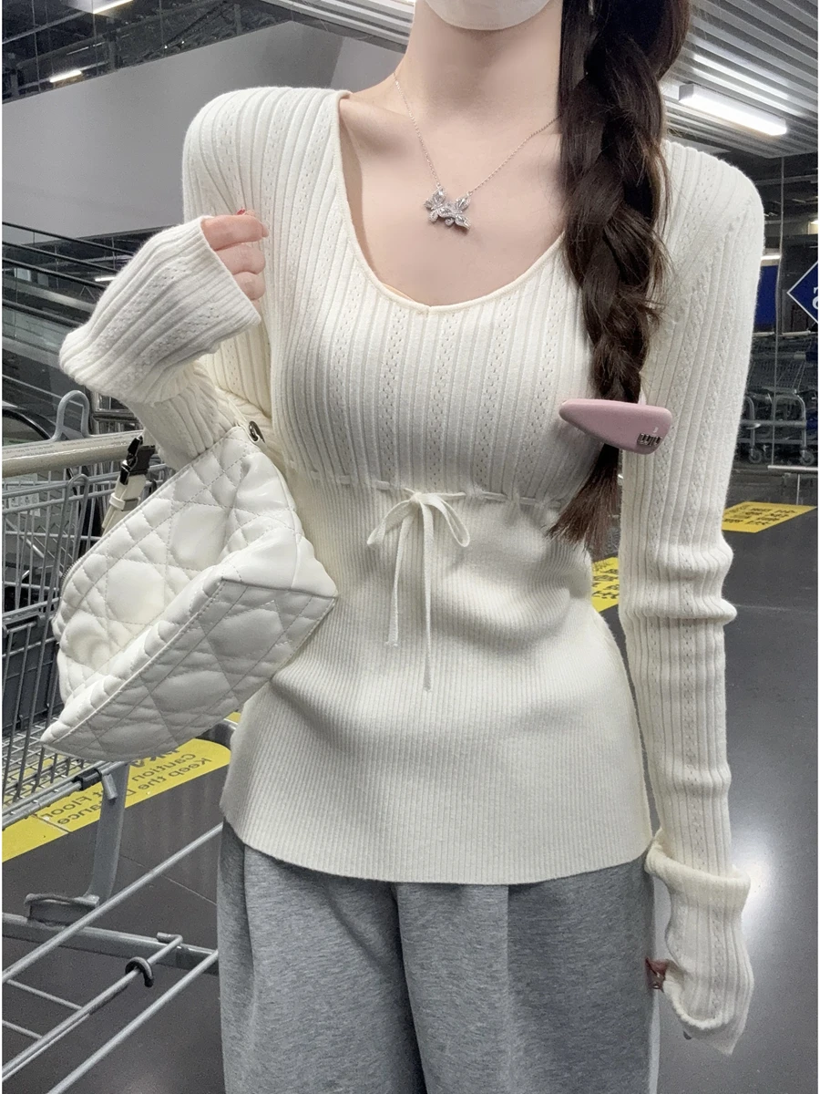 

French Sle Long Sve Knitted Sweater Women's Hollow V-ne Dstring Waist Design Inner Wear Spring New Faion Top