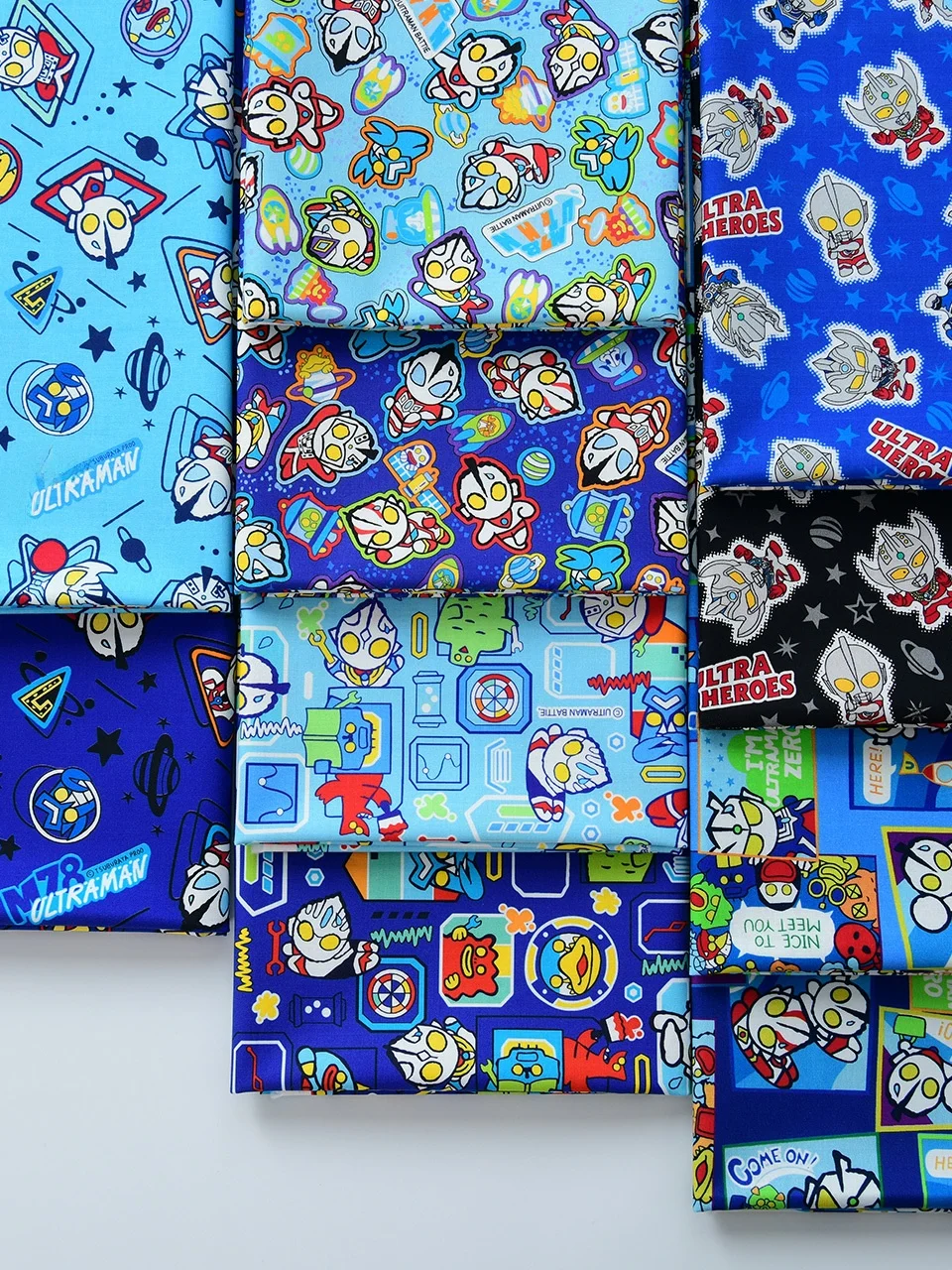 tecido-de-algodao-puro-com-estampa-de-desenho-animado-para-artesanato-diy-capa-de-colcha-roupa-infantil-de-heroi-azul-teci