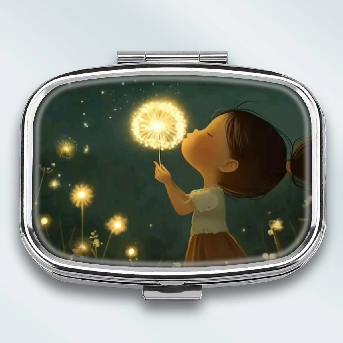 A Portable Square Metal Pill Box Featuring Romantic Nighttime Moments, with a 2-Compartment Design, Perfect for Elegantly Storing Your Medications or Supplements. It Is Perfect for Sorting Vitamins and Storing Small Items.