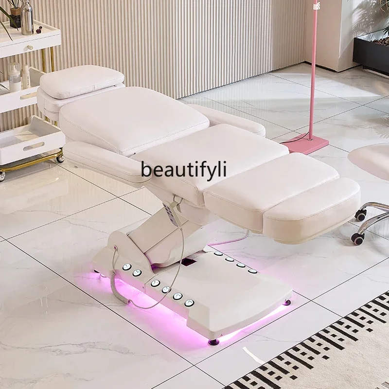 53High-grade electric lifting beauty bed with foot control heating integrated micro-plastic bed fully automatic